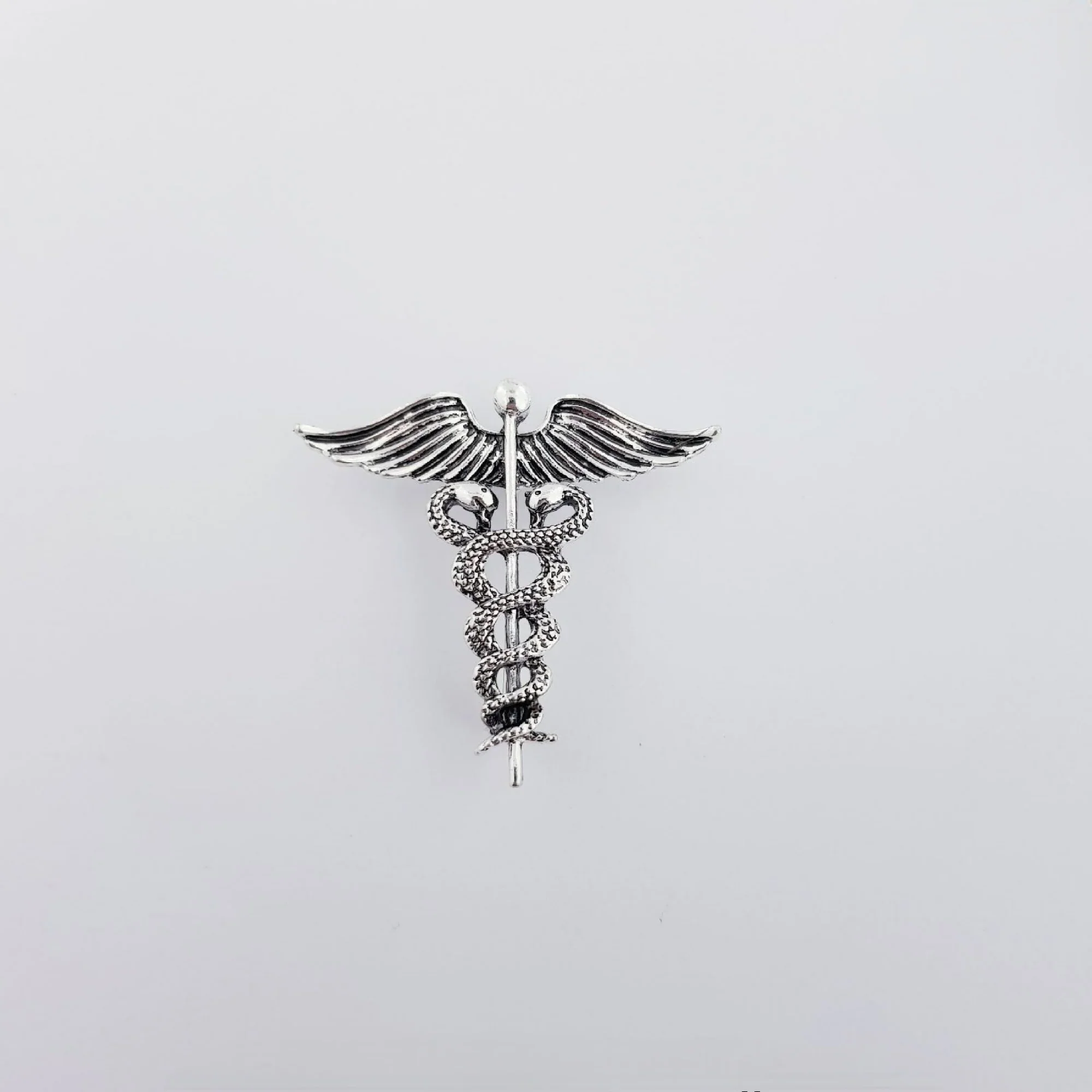 THE GOOD DOCTOR - ANTIQUE SILVER